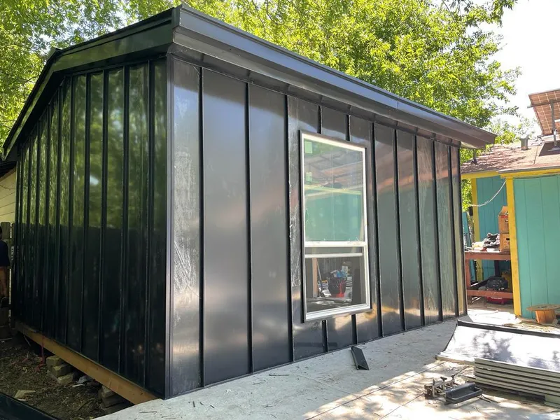 Black standing seam metal wall panels for Roof Inspection in Paloma Creek South